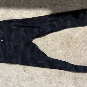 Black camouflage leggings.
